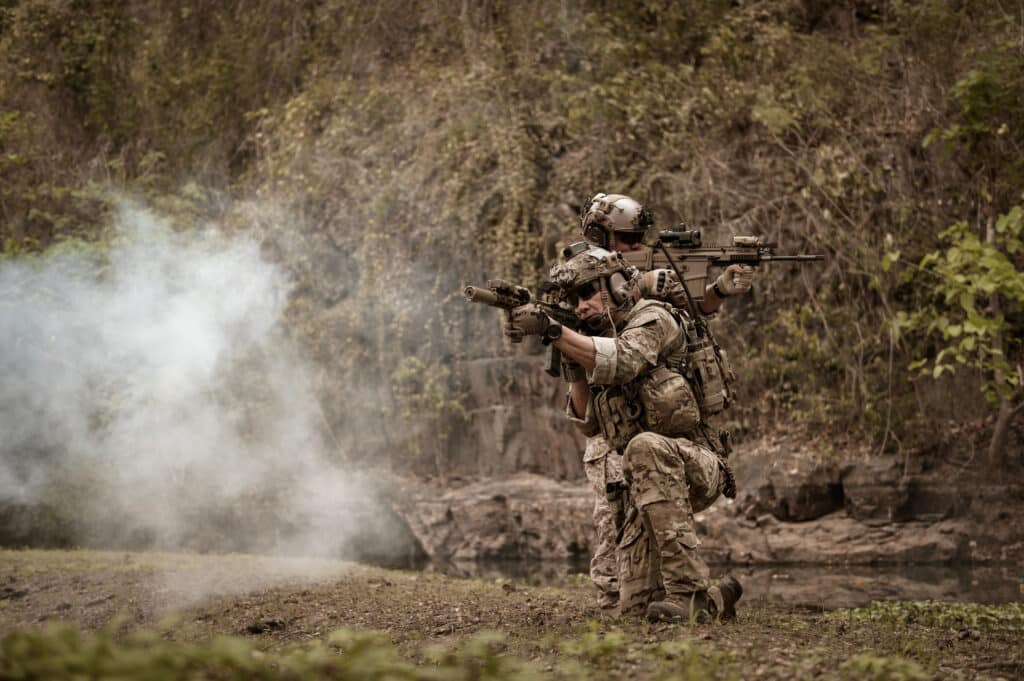 Soldiers using guns for drone defense